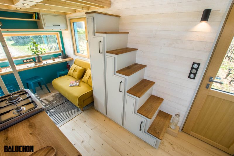 This Tiny House Features Netted Floor to Connect Loft Bedrooms