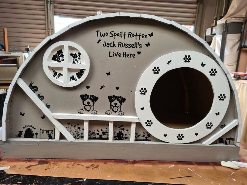 DIYer Woman Builds Hobbit Style Dog House for Her Pups