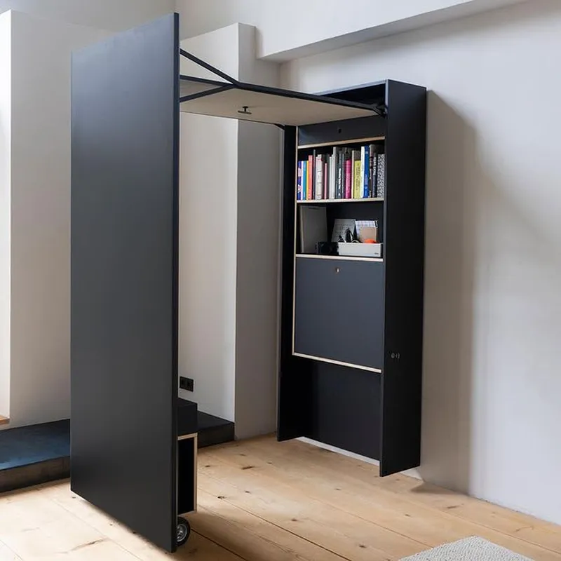 DER VORSTAND Wall Cabinet Transforms Into a Working Desk