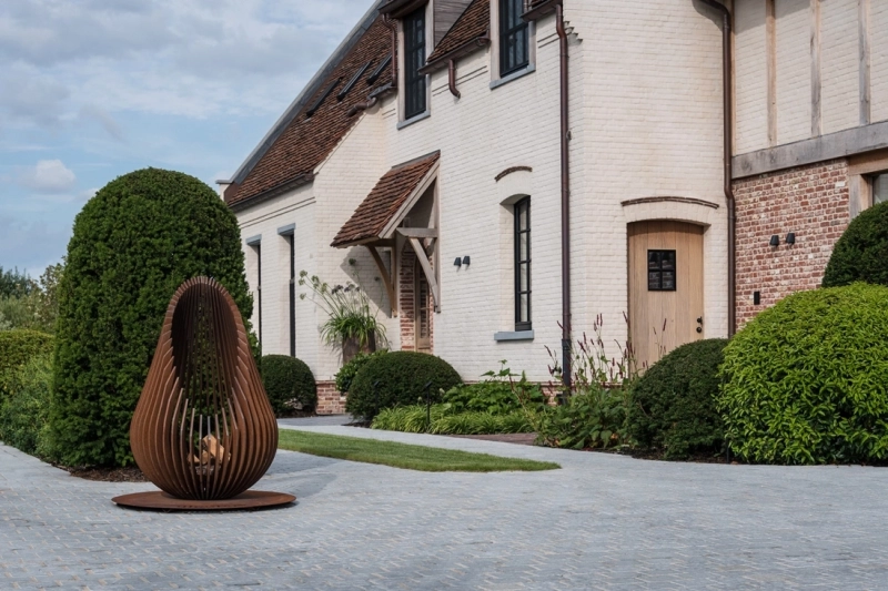 Dewdrop fire pit by Glowbus is made of Corten Steel