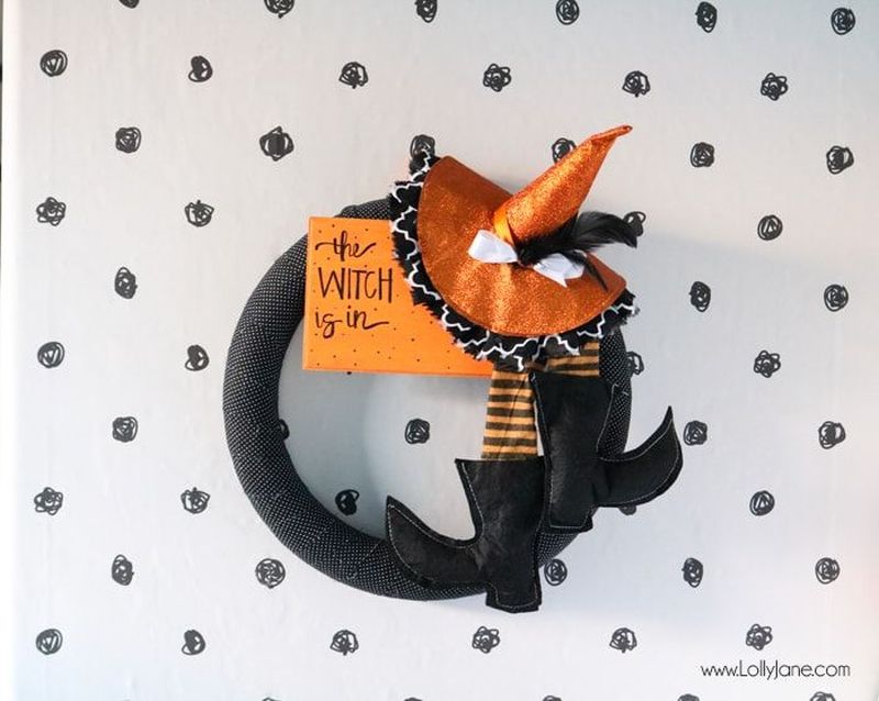 Display this easy and festive fabric wrapped witch wreath for your Halloween party