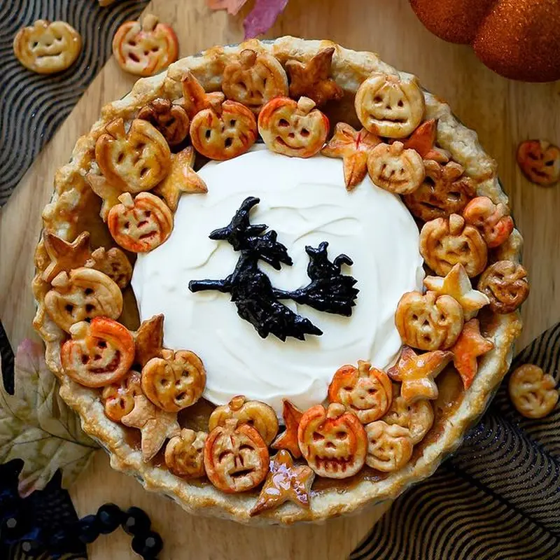 witch on cheesecake inside the pumpkin pie 