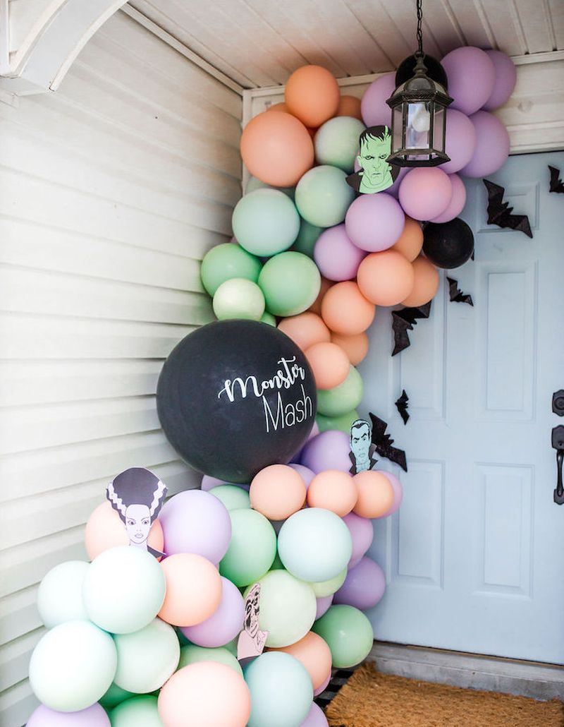 Pastel Balloon Arch front door for Halloween 