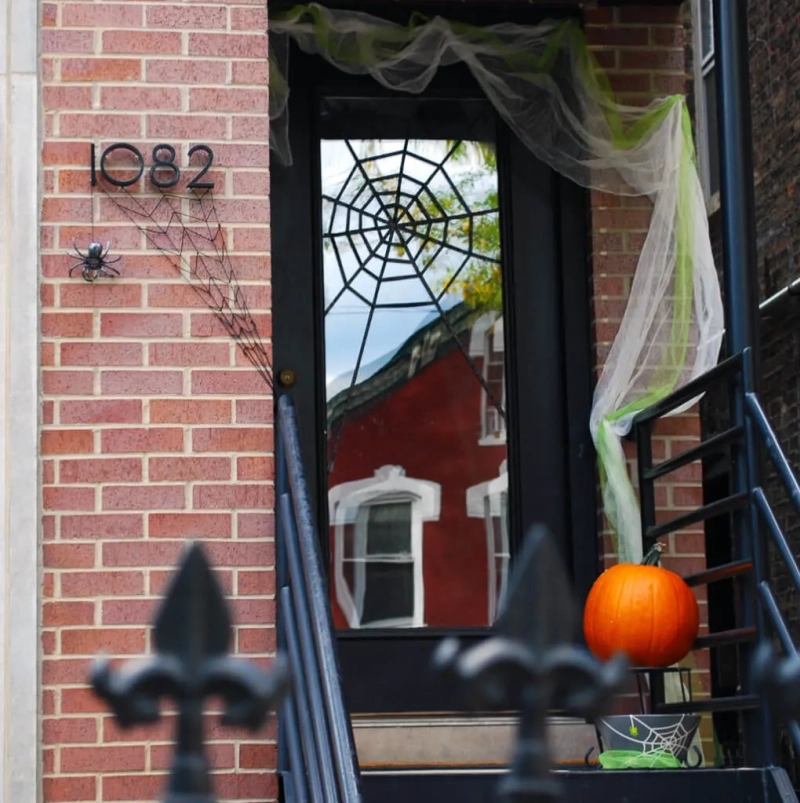 Spiders and Web on Front Door for Halloween Decoration  