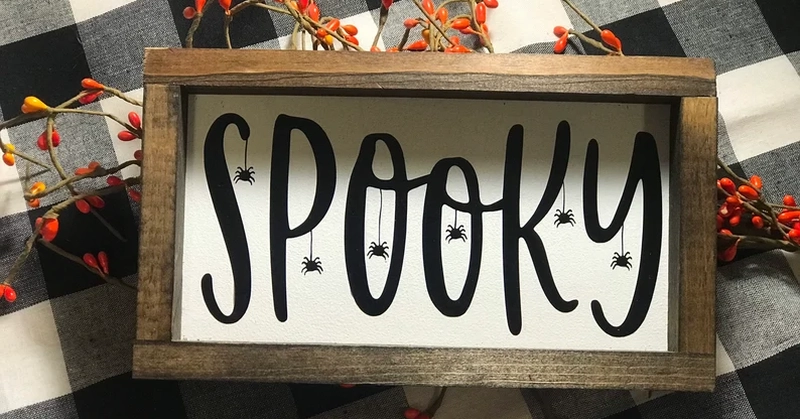 Spooky wooden sign for Halloween 