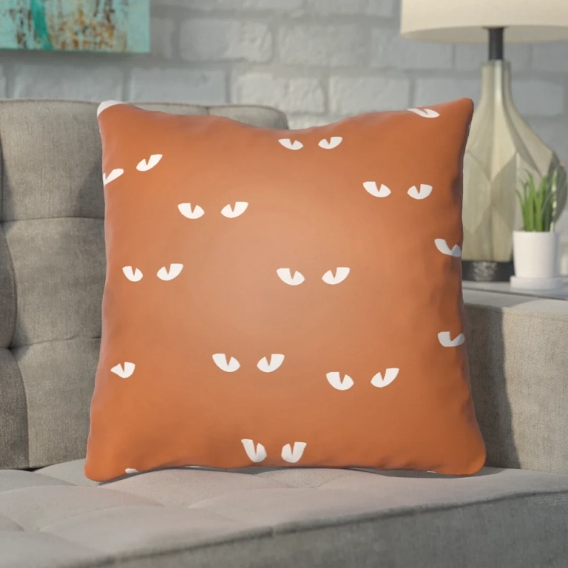 bat eye-printed throw pillow 