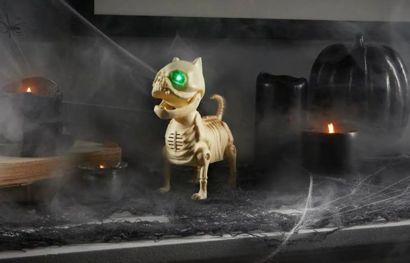 This skeleton dog with green LED eyes, animated barking mouth and wagging tail create a spooky effect