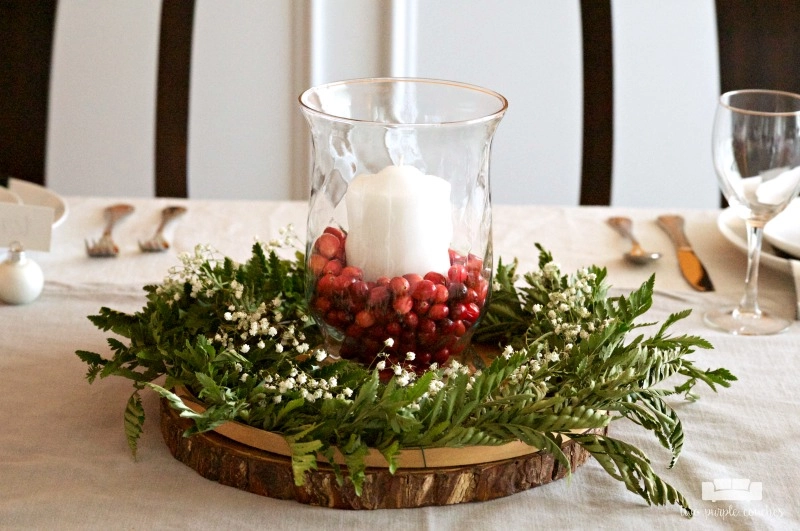 Christmas Table Centerpiece with Hurricane Vase and red Cranberries