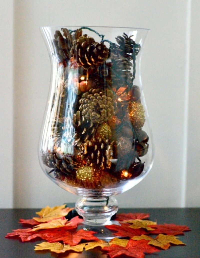  Pine cone display with lights and ornaments