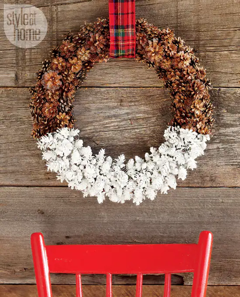 Dipped pine cone Christmas wreath for a snow-covered effect