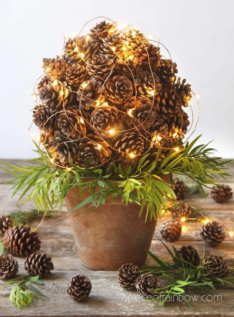 pine cone topiary crafted with string lights