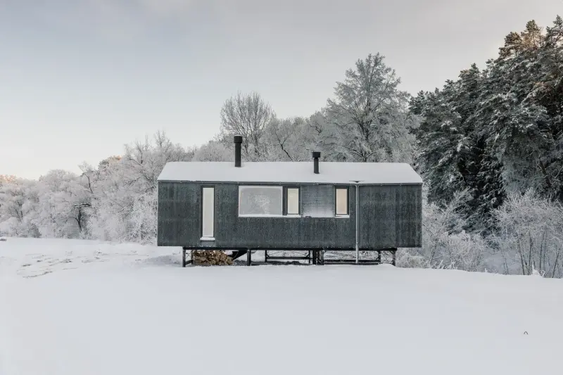 BIO Architects Designs TOPOL27 Prefab Cabin for Rental Businesses_winter view_11