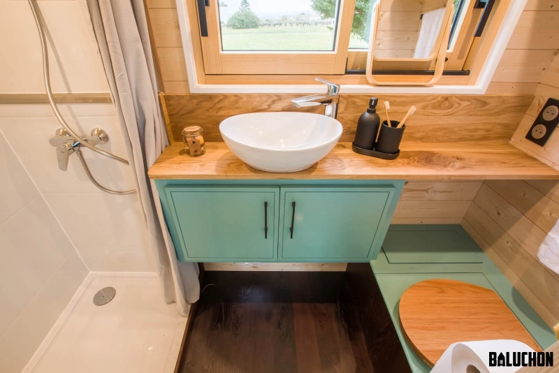 Kalzenning Tiny Touse on Wheels by Baluchon has Two Loft Bedrooms bathroom