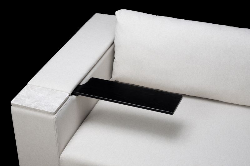 Rezy Sofa has Built-in Table, Storage, and Charging Facilities