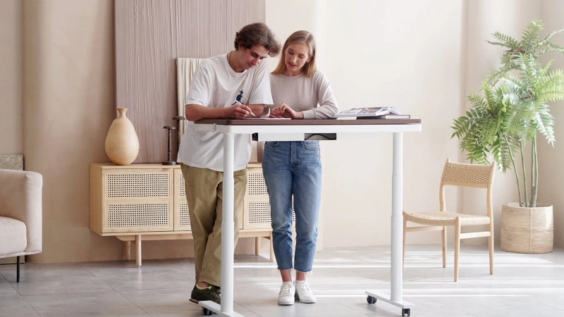 This Standing Desk by Oselem Design has Built-in Charging Facilities, Storage Drawer