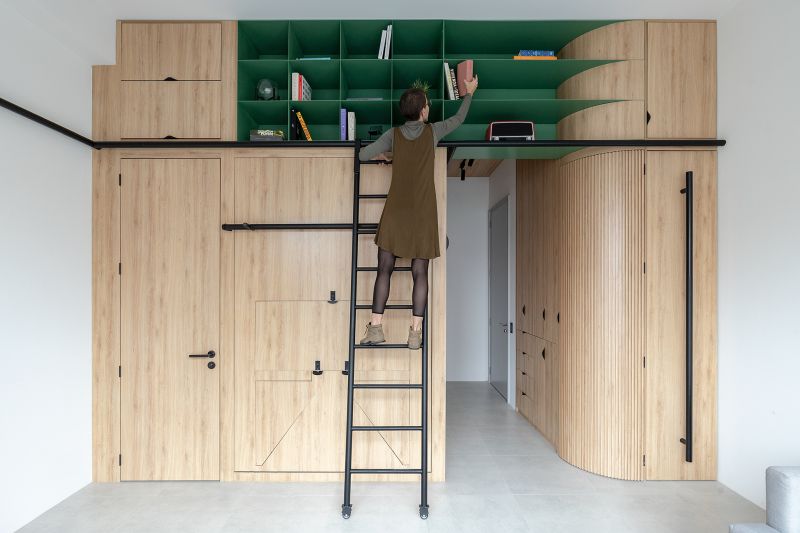 This Apartment in Quito Conceals Kitchen, Bedroom, Bathroom and Storage Inside Custom Cabinets