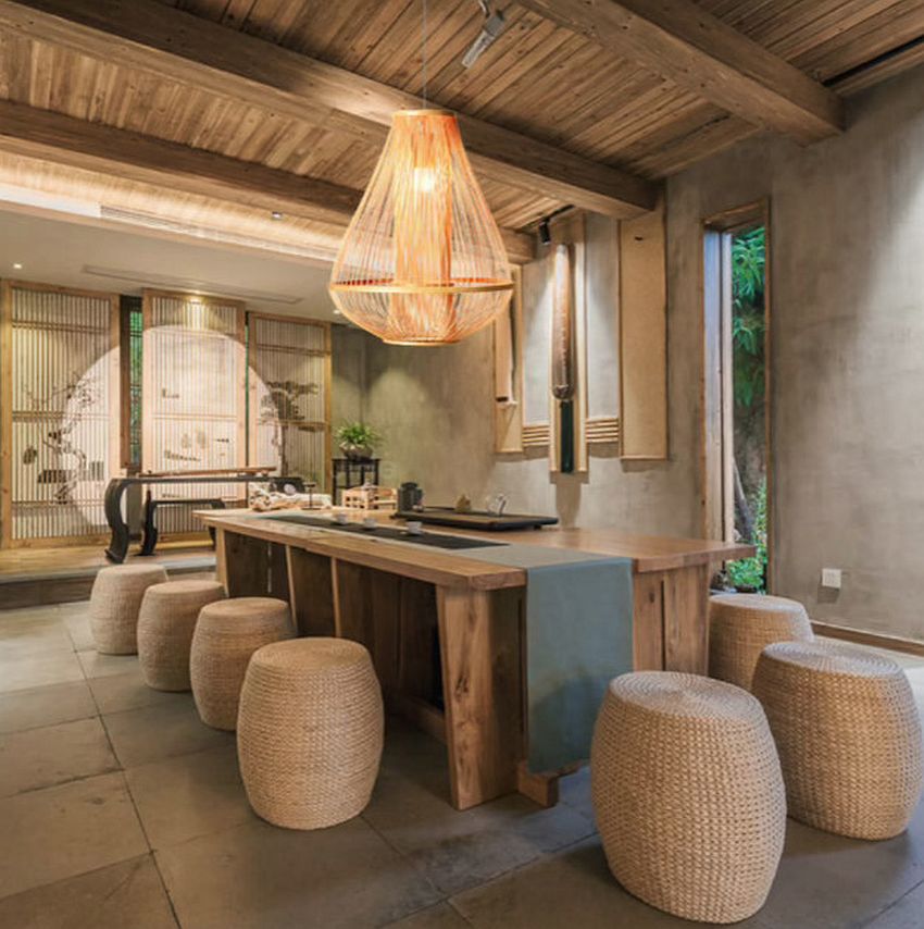 Natural finishes and warm lighting shape this gorgeous Japandi style dining room