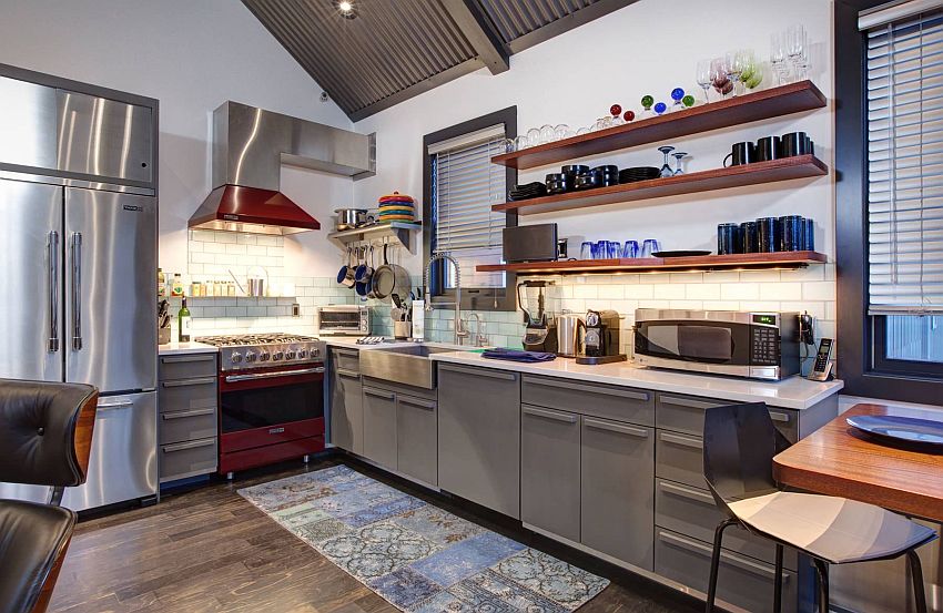 Sleek open shelves in wood create a more spacious looking kitchen