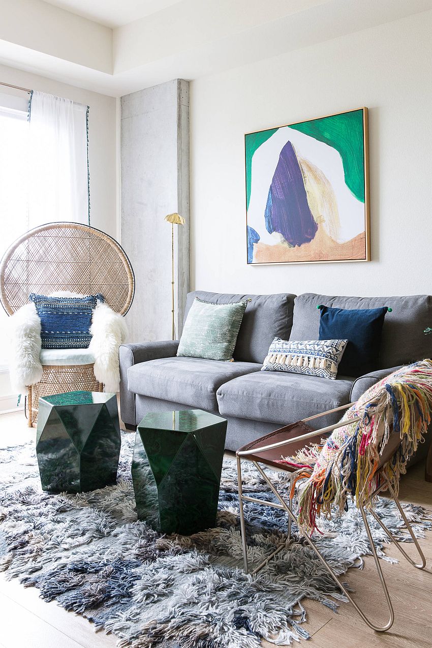 Bring bohemian touches to the modern living space with wall art and throws