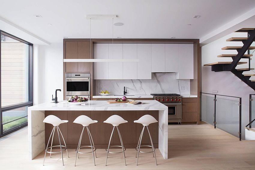 Creative wood and white kitchen with a striking marble backsplash