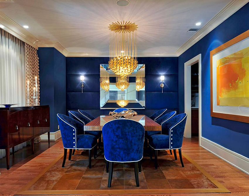 Dashing chandelier adds golden dazzle to this awesome dining room