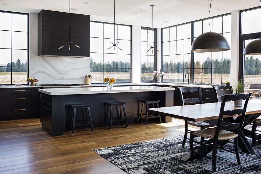 Spacious and well-lit kitchen with a lovely white marble backsplash