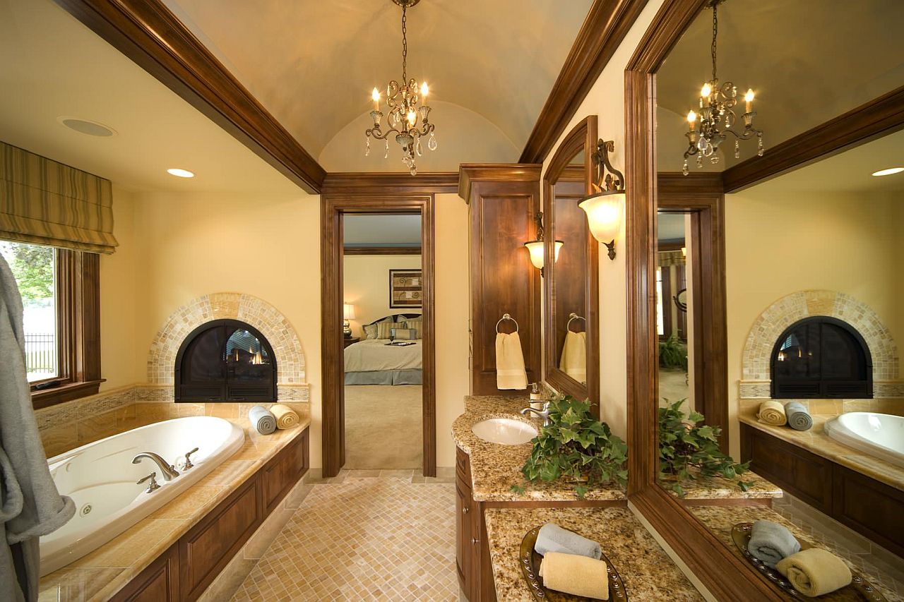 Mediterranean style bathroom with a timeless fireplace and textured walls