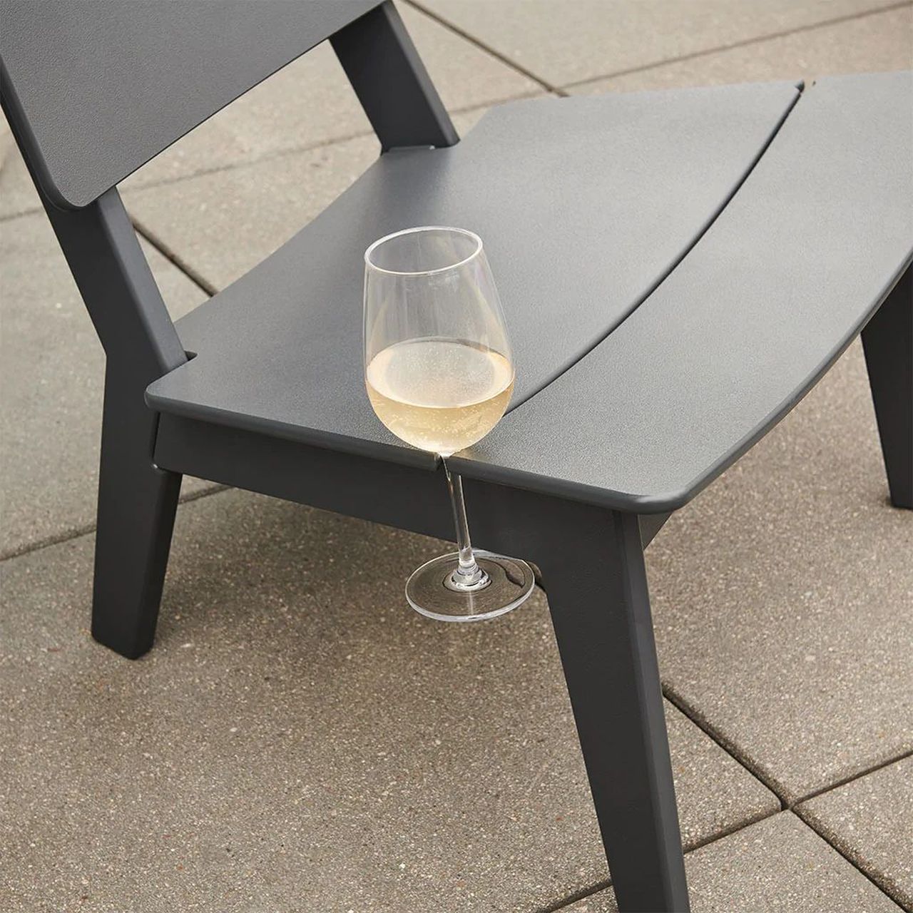 This Lounge Chair can Hold Your Wine Glass