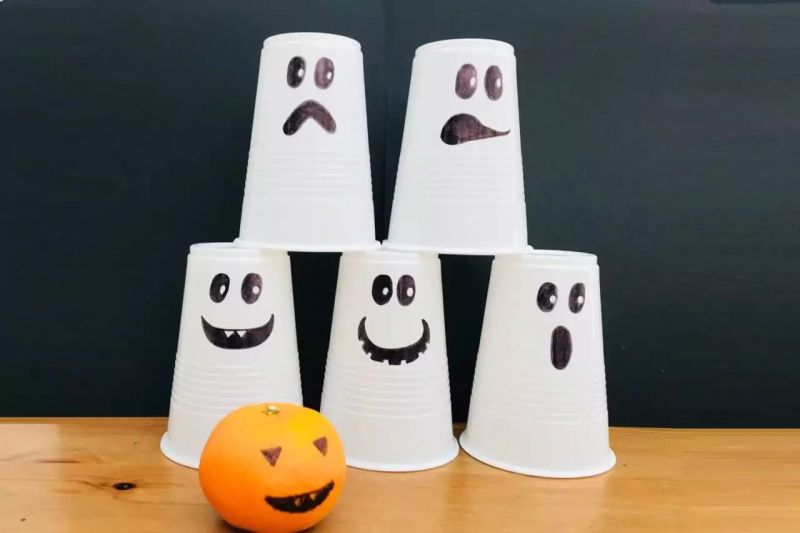 Cup Knock Down Game for kids at Halloween Party