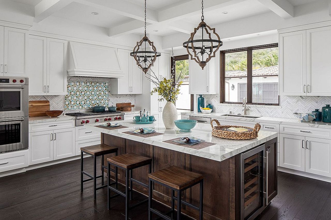 Curvy form of the iron body adds to the Arabesque charm of the pendants above kitchen counter