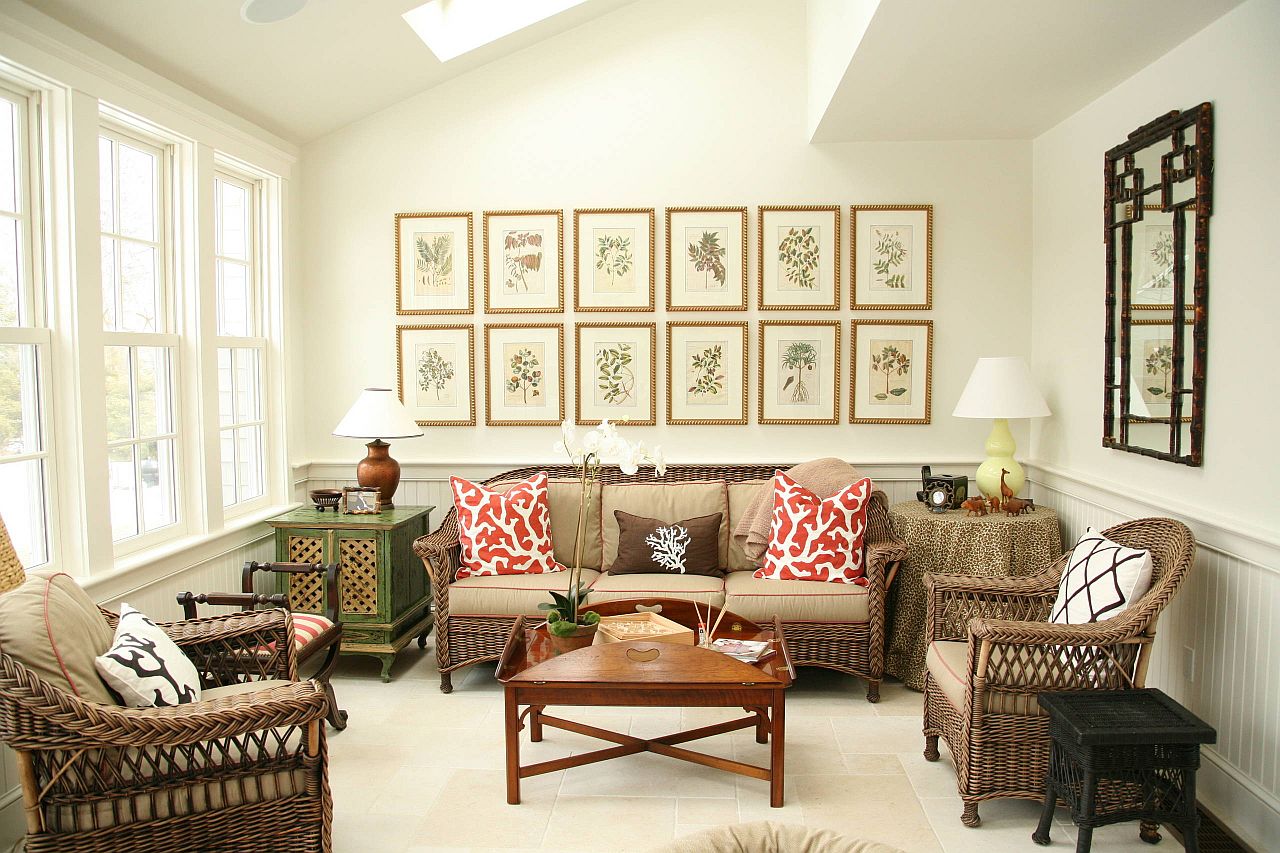 Framed botanicals along with throw pillows with leafy motifs are a hit in this living room