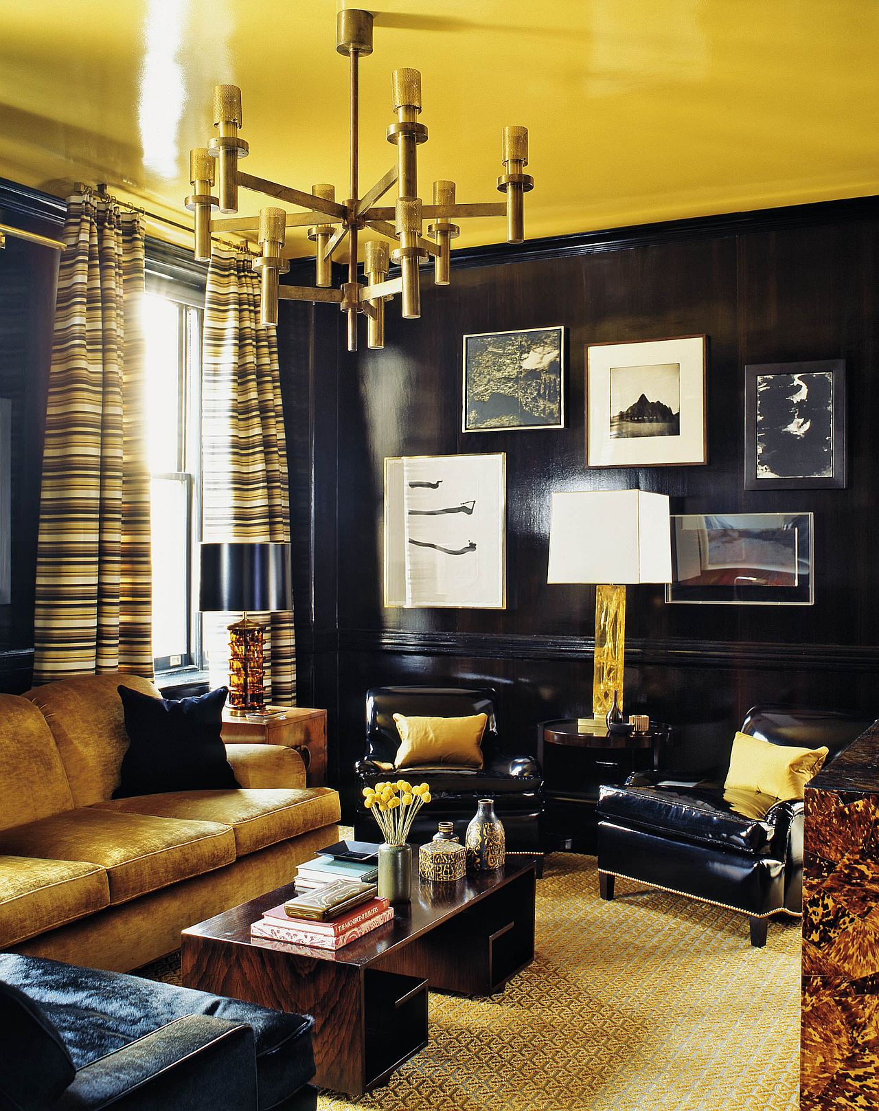 Gold finds a place of prominence in this art deco living space