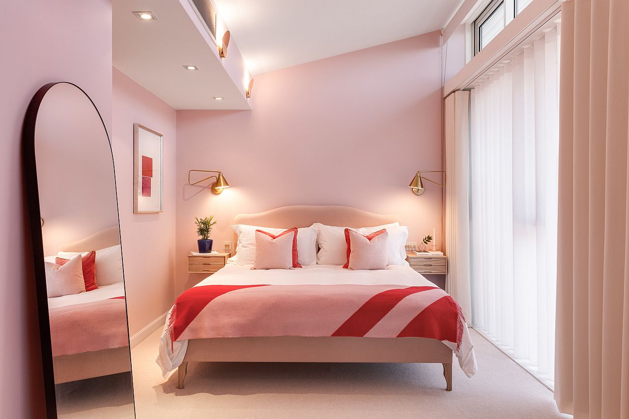 Plush pink bedroom with plenty of natural light