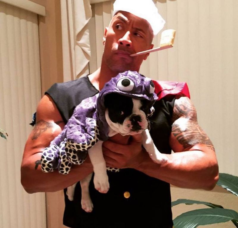 Dwayne ‘The Rock’ Johnson Adorns his Frenchie Baby in a Violet Colored Costume 