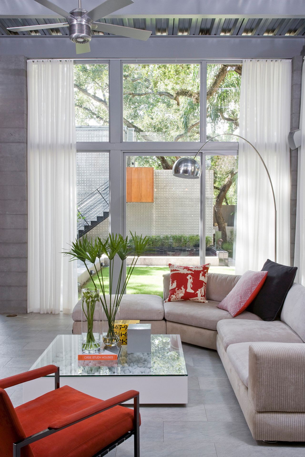 Gray living room with white sheer curtains