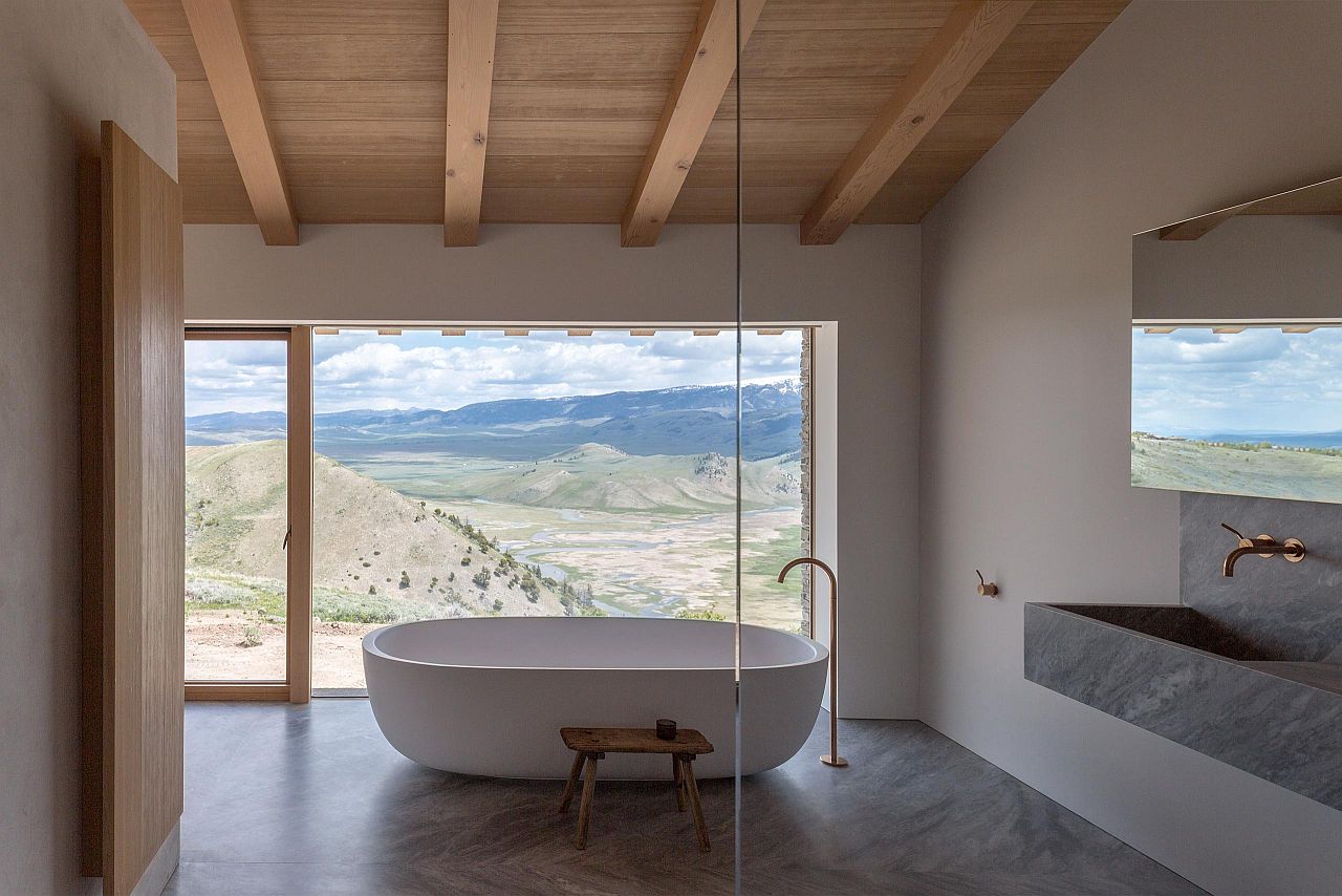 Lovely freestanding bathtub in white brings something different to the minimal bathroom