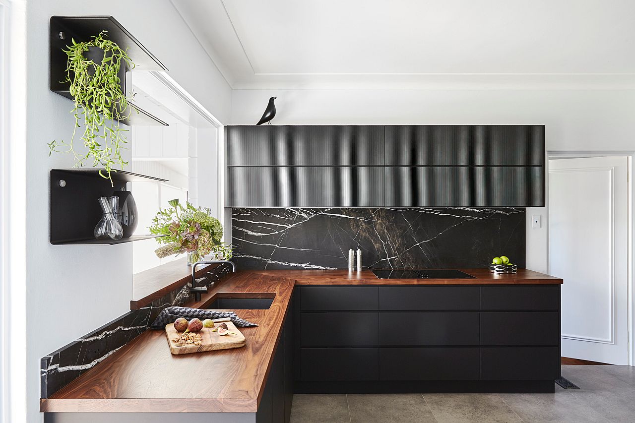 Natural stone backsplash in black is just perfect for the modern kitchen