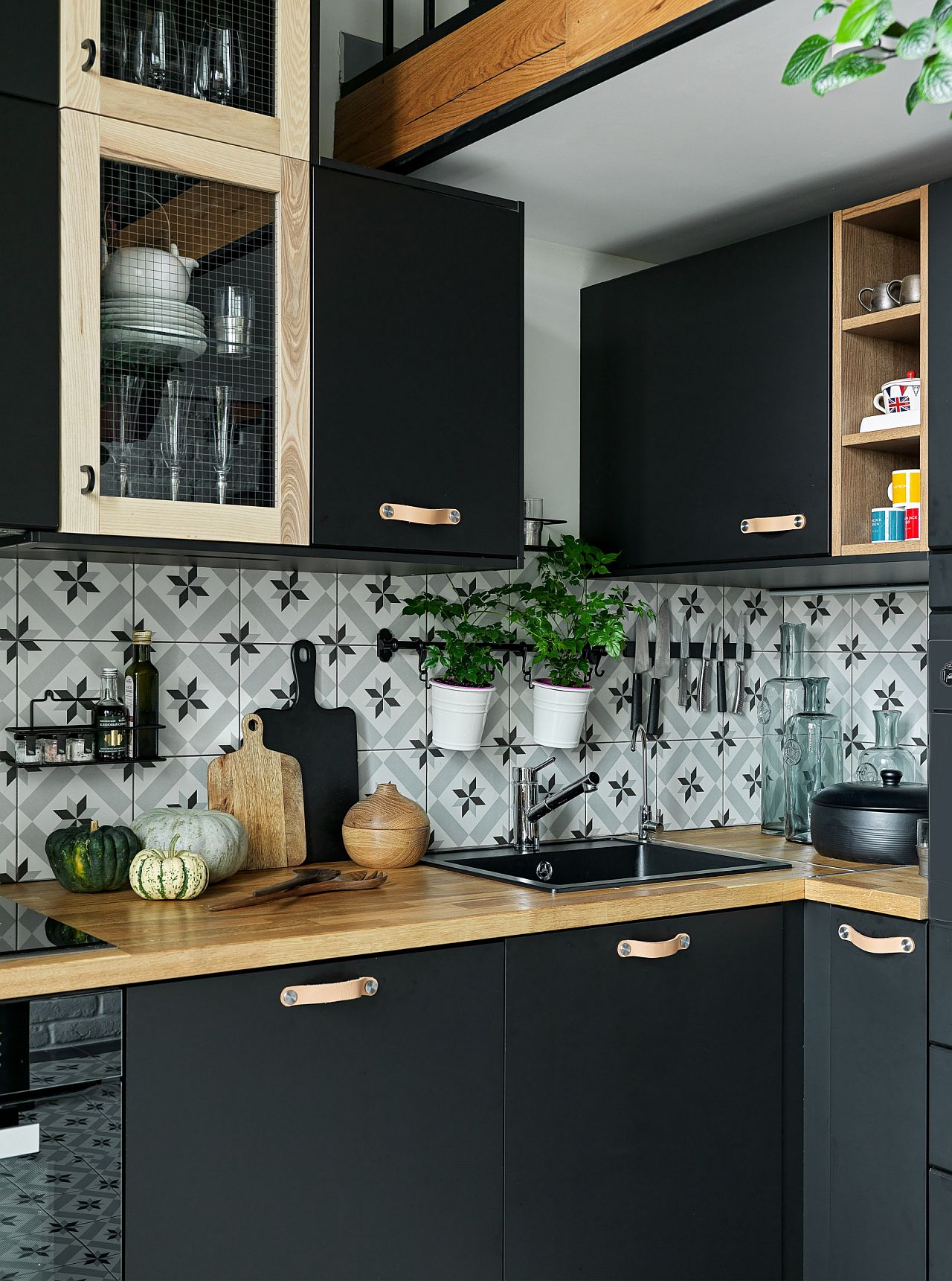 Painting the cabinets black in the small modern kitchen