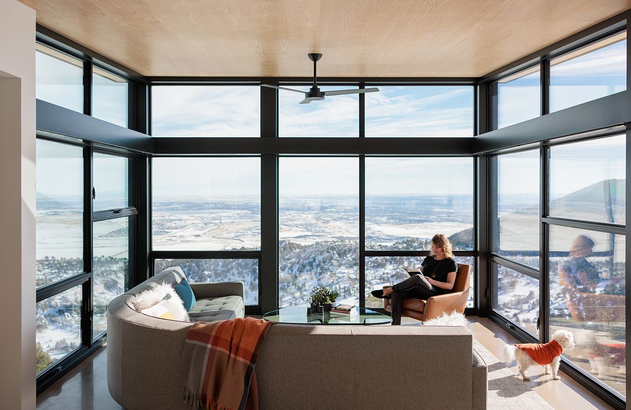 Stunning floor-to-ceiling glass walls bring the outdoors inside