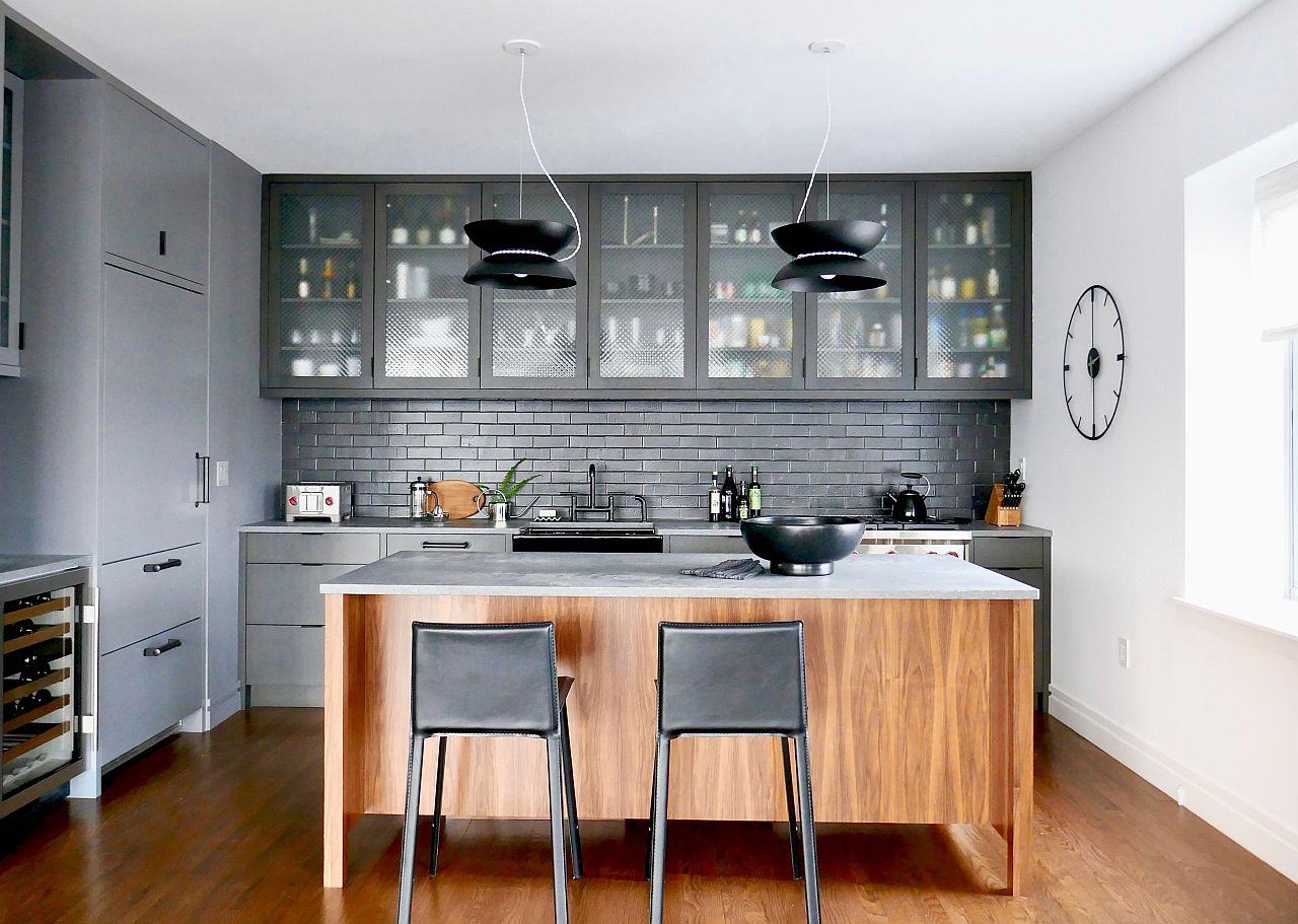 Tiles in black create a striking backsplash in this kitchen