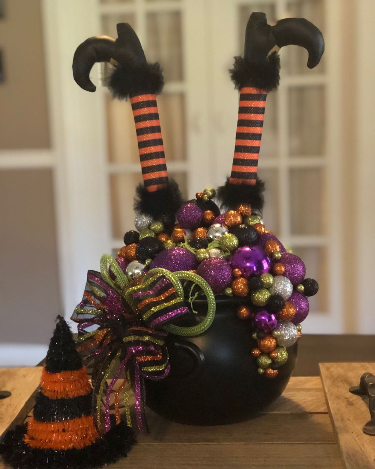 Crashing witch in a cauldron