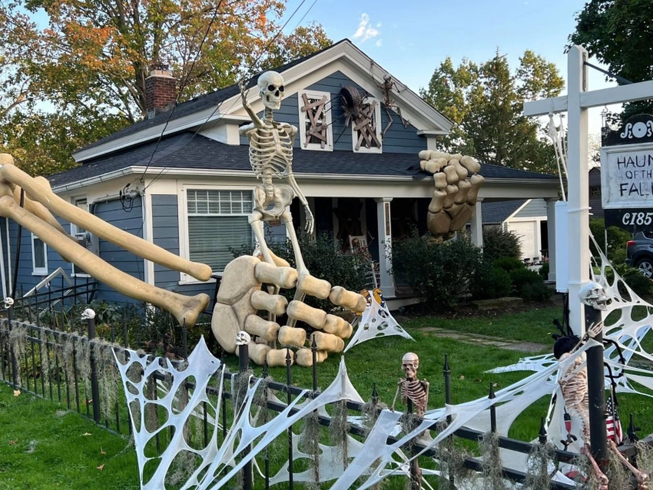 Halloween display featuring multiple skeletons