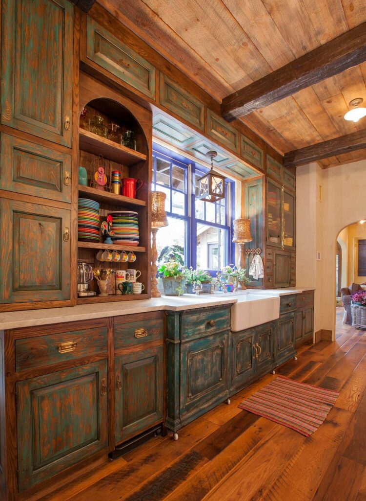 Kitchenware adds color to this woodsy rustic kitchen