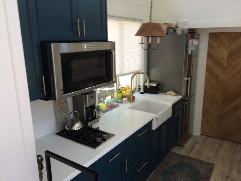 tiny house kitchen with white countertop 