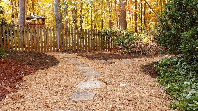 Brittany Bailey created affordable mulch and stone garden pathway