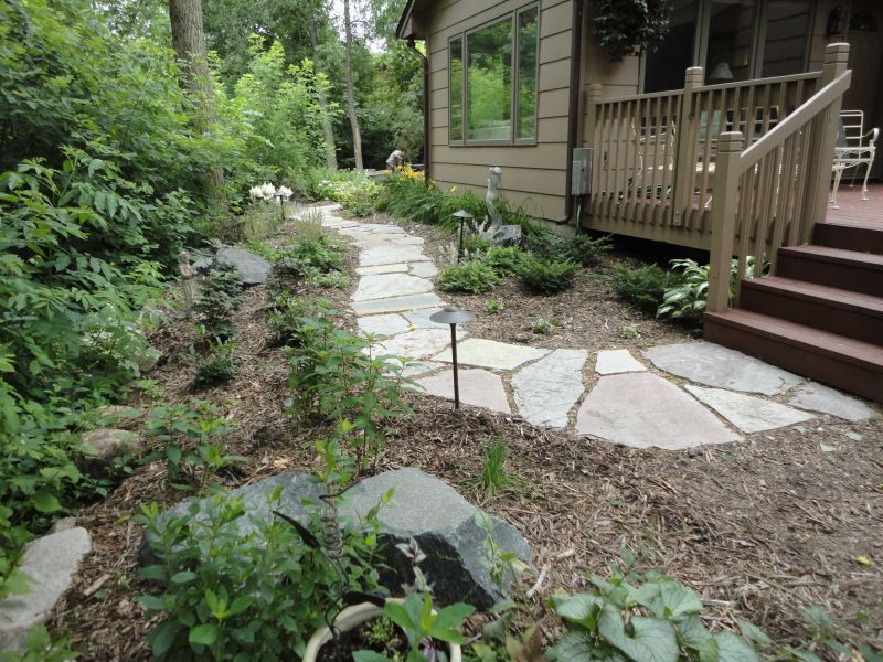 Irregular flagstone walkway by Living Space Landscapes