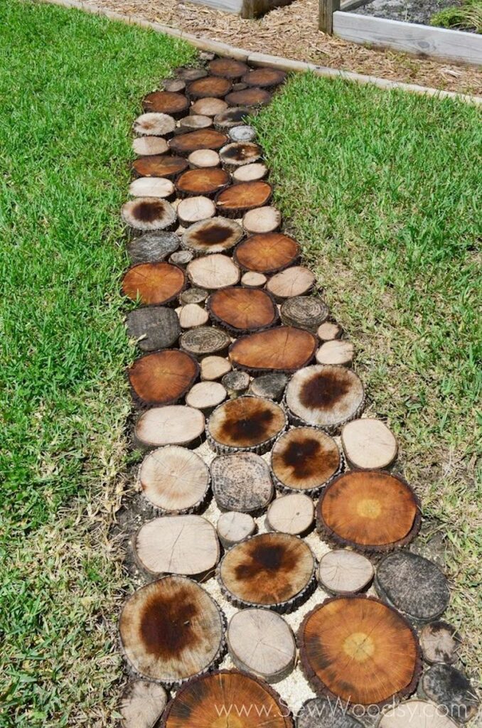 DIY Rustic log pathway for garden decor by Sew Woodsy