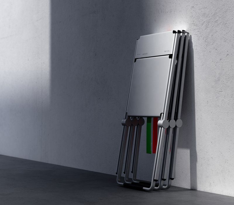 Tekron folding Chairs resting over the wall