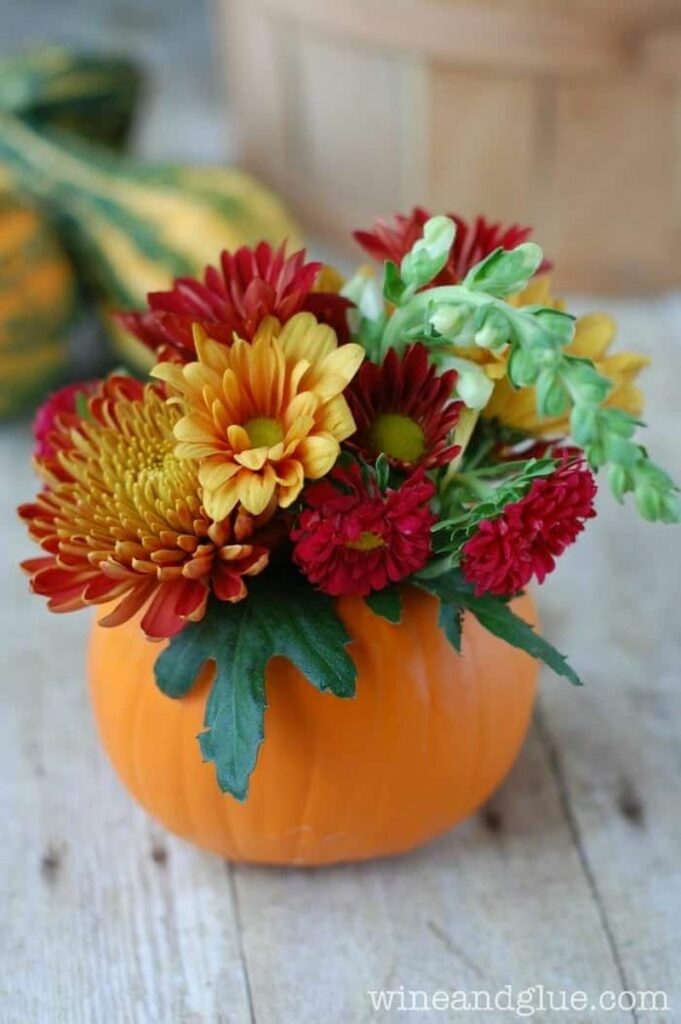 mini pumpkin flower arrangement for dining table 