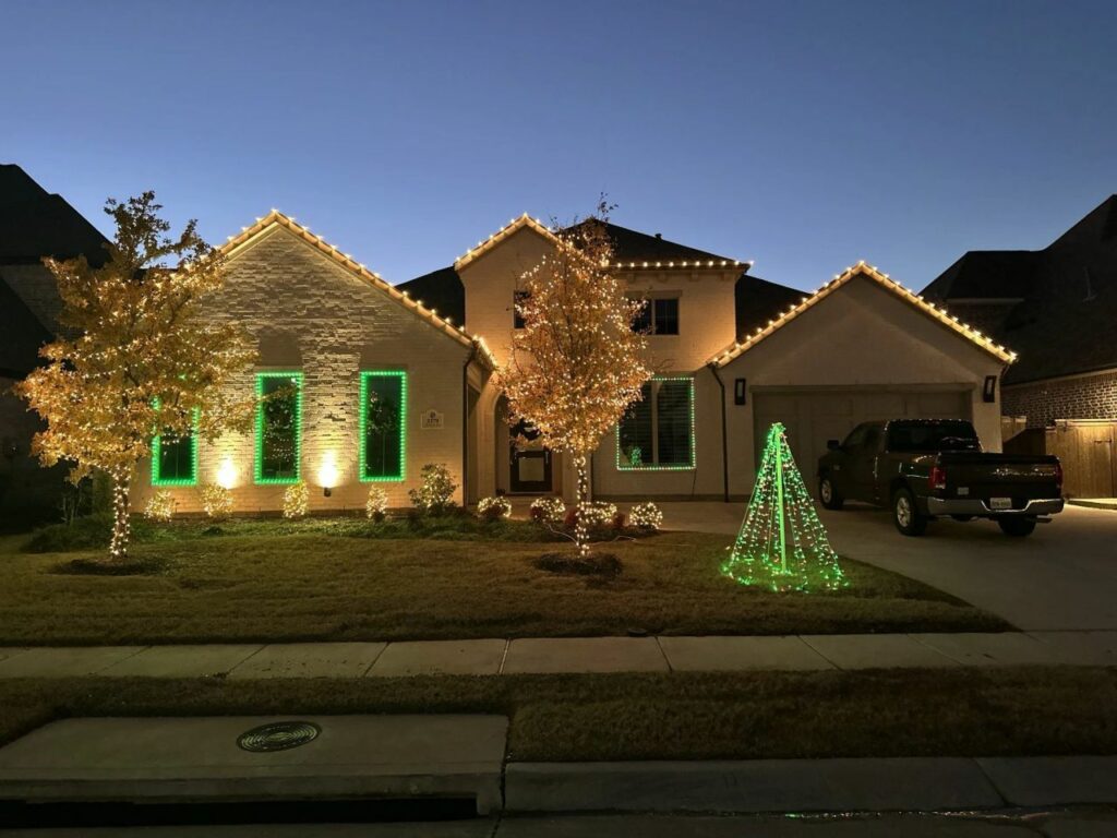 golden and green light strings on house front 